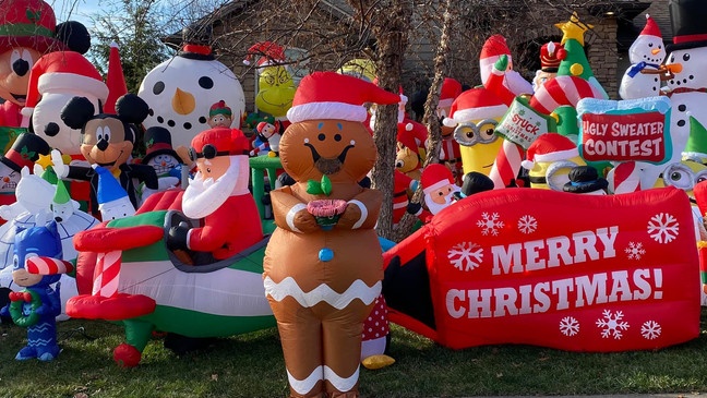 photo of a dozen holiday inflatables