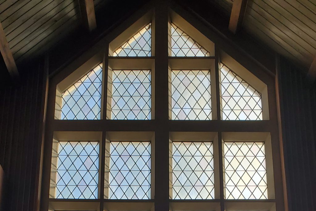 photo of the top of the sanctuary back window