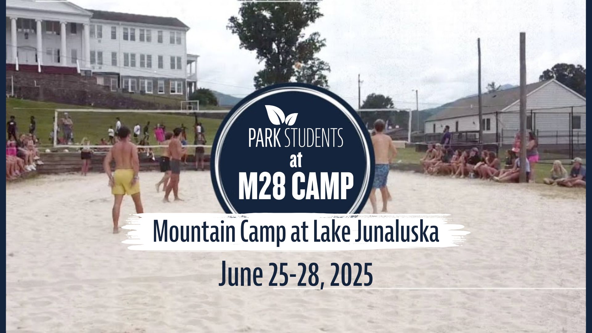 Teens playing beach volleyball with M28 Camps logo